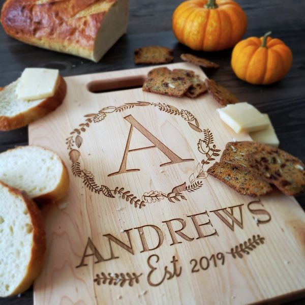 Family Name with Foliage, Branches or Greenery Personalized Maple Handle Cutting Board