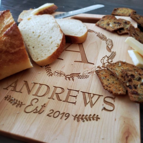 Family Name with Foliage, Branches or Greenery Personalized Maple Handle Cutting Board